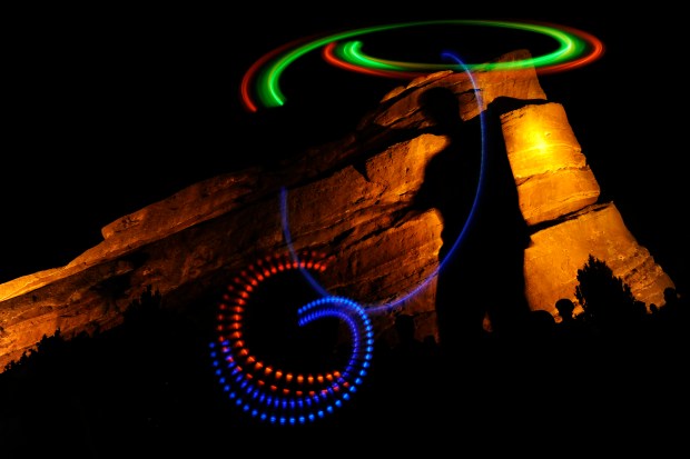 A fan dances to Skrillex during a concert at Red Rocks Amphitheatre in Morrison, Colorado on August 9, 2012.