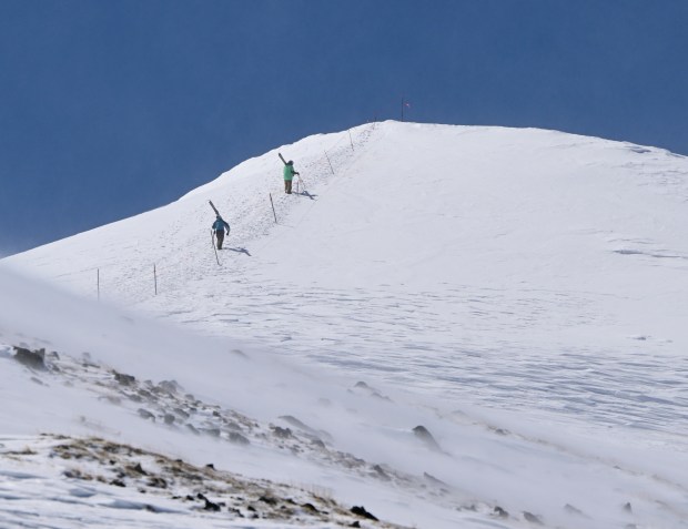 Skiers hike to the top of Peak 8 at the Breckenridge Ski Resort in Breckenridge, Colorado, on Thursday, April 9, 2025. (Photo by Andy Cross/The Denver Post)