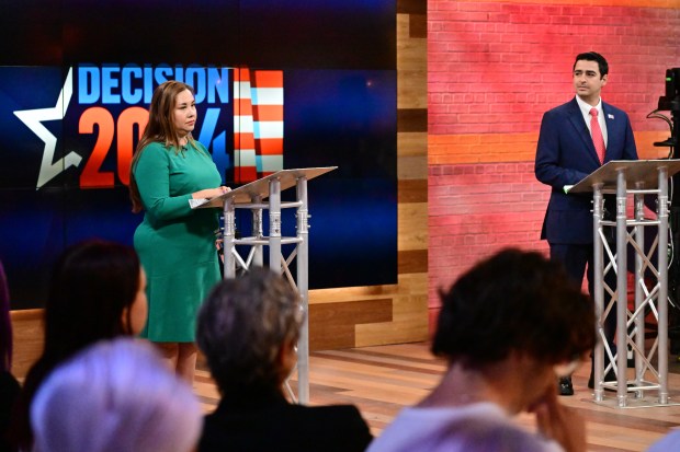 Congresswoman Yadira Caraveo, the Democratic incumbent, left, and Republican state Rep. Gabe Evans participate in an 8th Congressional Debate in 9News' studio in Denver on Tuesday, Oct. 8, 2024. (Photo by Hyoung Chang/The Denver Post)