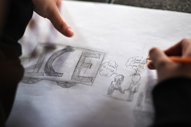 Jusly Rodriguez Velasquez, 12, draws for a magazine project during a workshop at the Convivir Moonshot office in Denver on Tuesday, April 1, 2025. (Photo by Hyoung Chang/The Denver Post)
