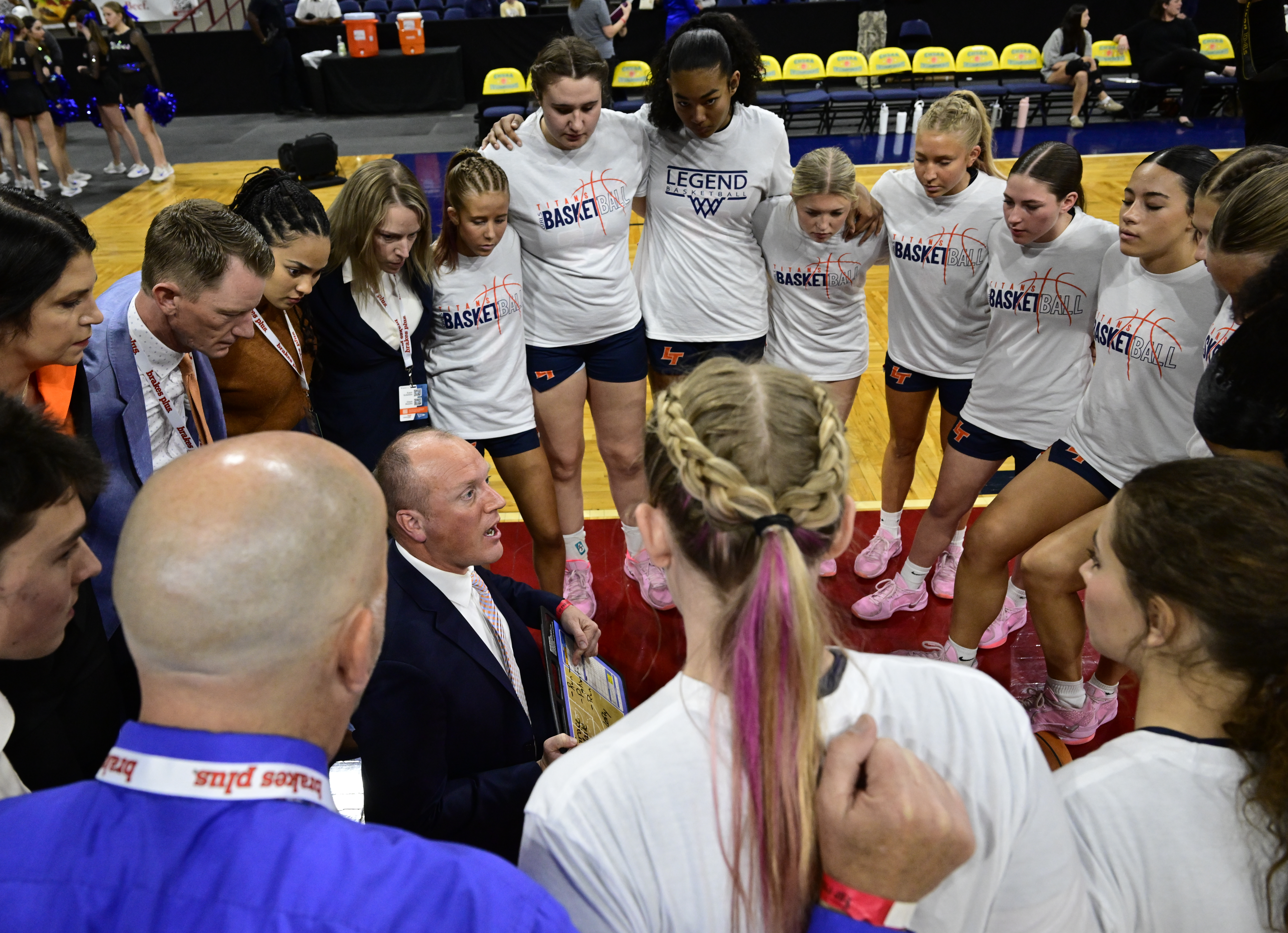 Legend Titans head coach Darren Pitzner talks to the team before the state high school girls Class 6A championship game against the the Grandview Wolves at the Denver Coliseum in Denver on Saturday, March 15, 2025. (Photo by Andy Cross/The Denver Post)