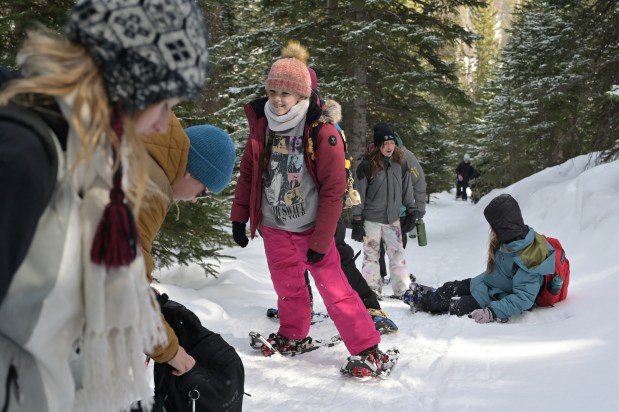 Avalon Parker, center, and her classmates snowshoe on Bear Lake Trail of Rocky Mountain National Park, Colorado, on Wednesday, March 5, 2025. (Photo by Hyoung Chang/The Denver Post)