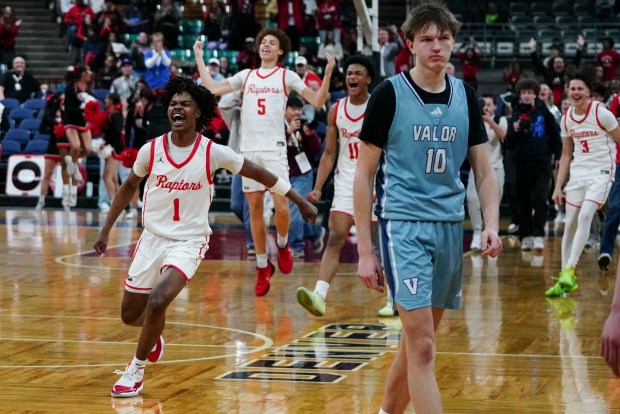 Eaglecrest's Anthony Nettles (1) runs on the court the celebrating winning the Class 6A Boy's Basketball State Championship game at Denver Coliseum, Saturday, March 15, 2025, in Denver. Eaglecrest High School's Boy's Basketball team won 65-63. (Rebecca Slezak/Special to The Denver Post).