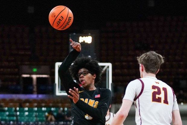 Green Mountain's Tre Gutierrez (3) passes to a teammate during the Class 5A Boy's Basketball State Championship game at Denver Coliseum, Saturday, March 15, 2025, in Denver. (Rebecca Slezak/Special to The Denver Post).