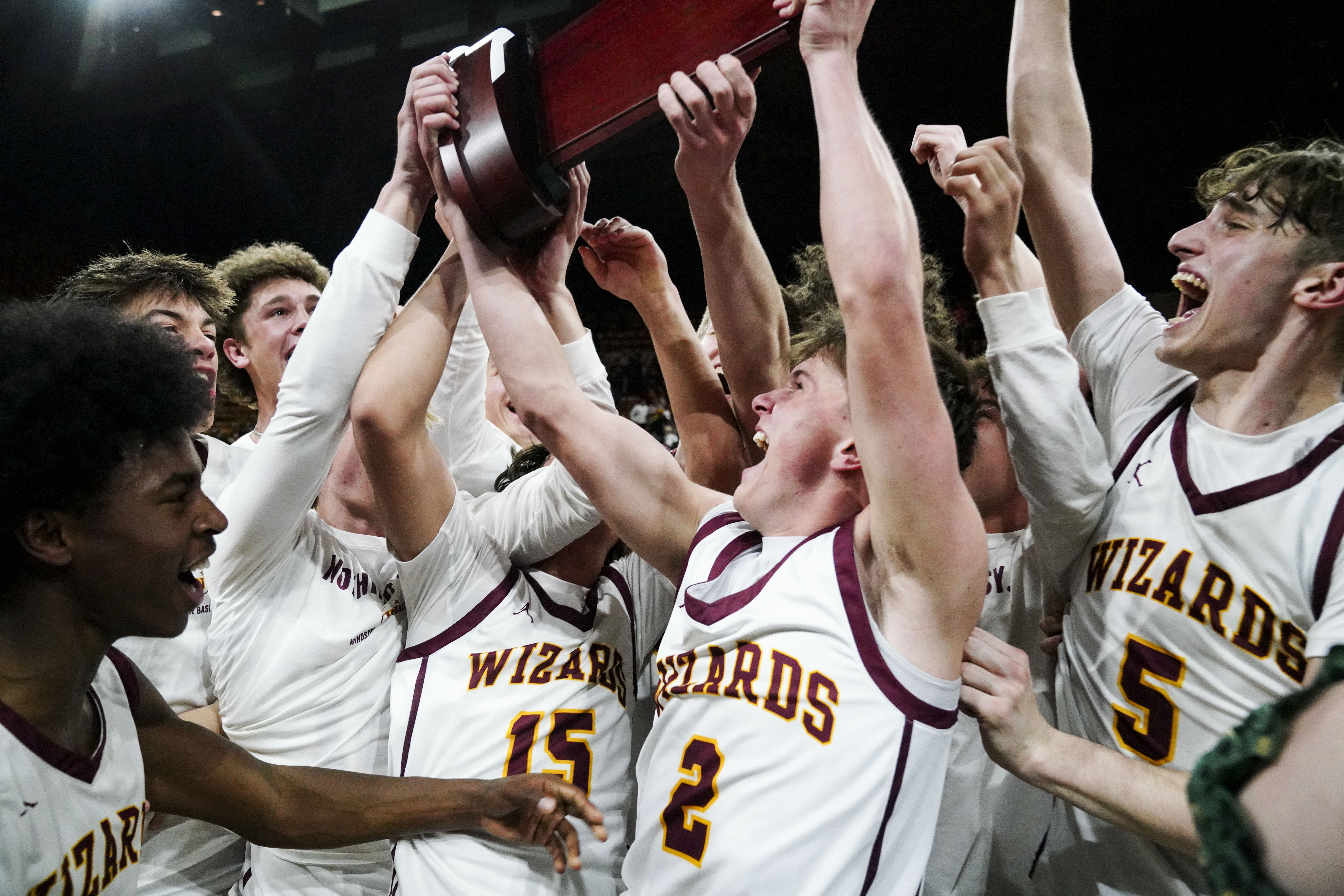Windsor High School Boy's Basketball team celebrates after winning the Class 5A Boy's Basketball State Championship game at Denver Coliseum, Saturday, March 15, 2025, in Denver. (Rebecca Slezak/Special to The Denver Post).