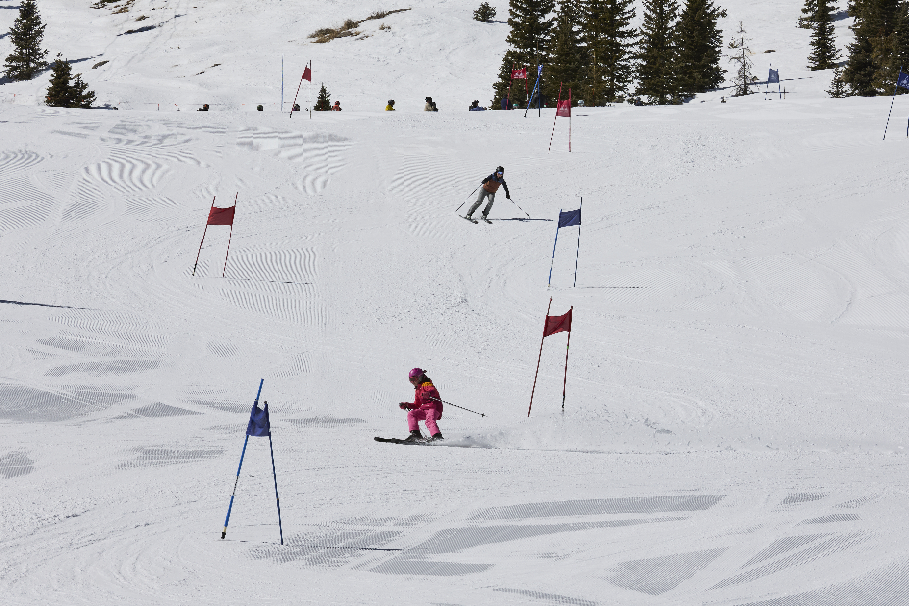 Sarah Tubbs and her daughter Afton Tubbs, of the Hinsdale Ski Team, compete in the Mardis Gras Fun Race at Wolf Creek Ski Area on March 1, 2025. (Photo by Jacob Spetzler/Special to The Denver Post)