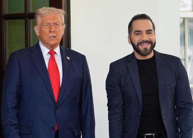 President Donald Trump, left, greets El Salvador's President Nayib Bukele as Bukele arrives at the White House, Monday, April 14, 2025, in Washington. (AP Photo/Manuel Balce Ceneta)